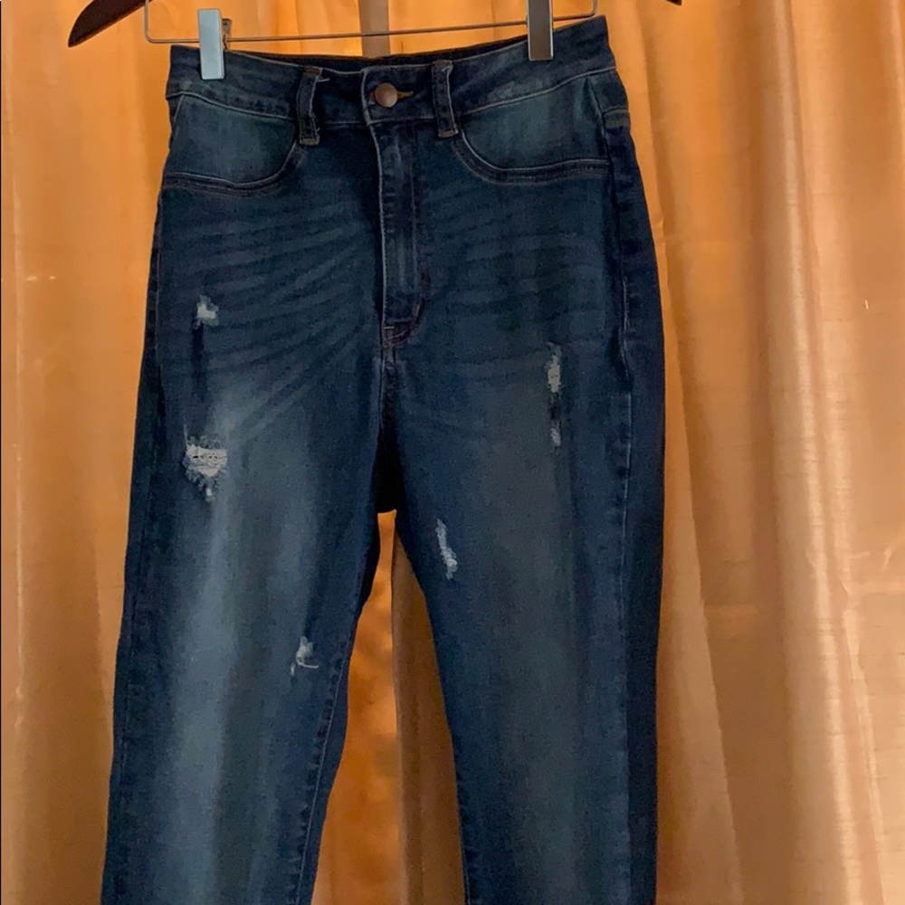 Lightly distressed medium wash denim